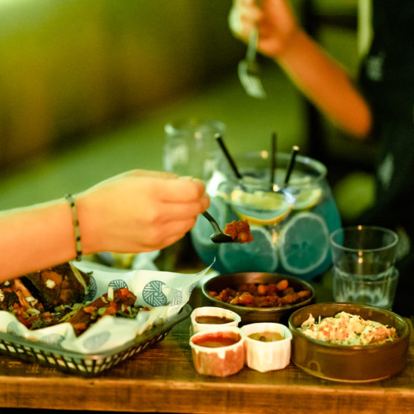 Food and drinks in the karaoke pod Christmas party venue Crookes