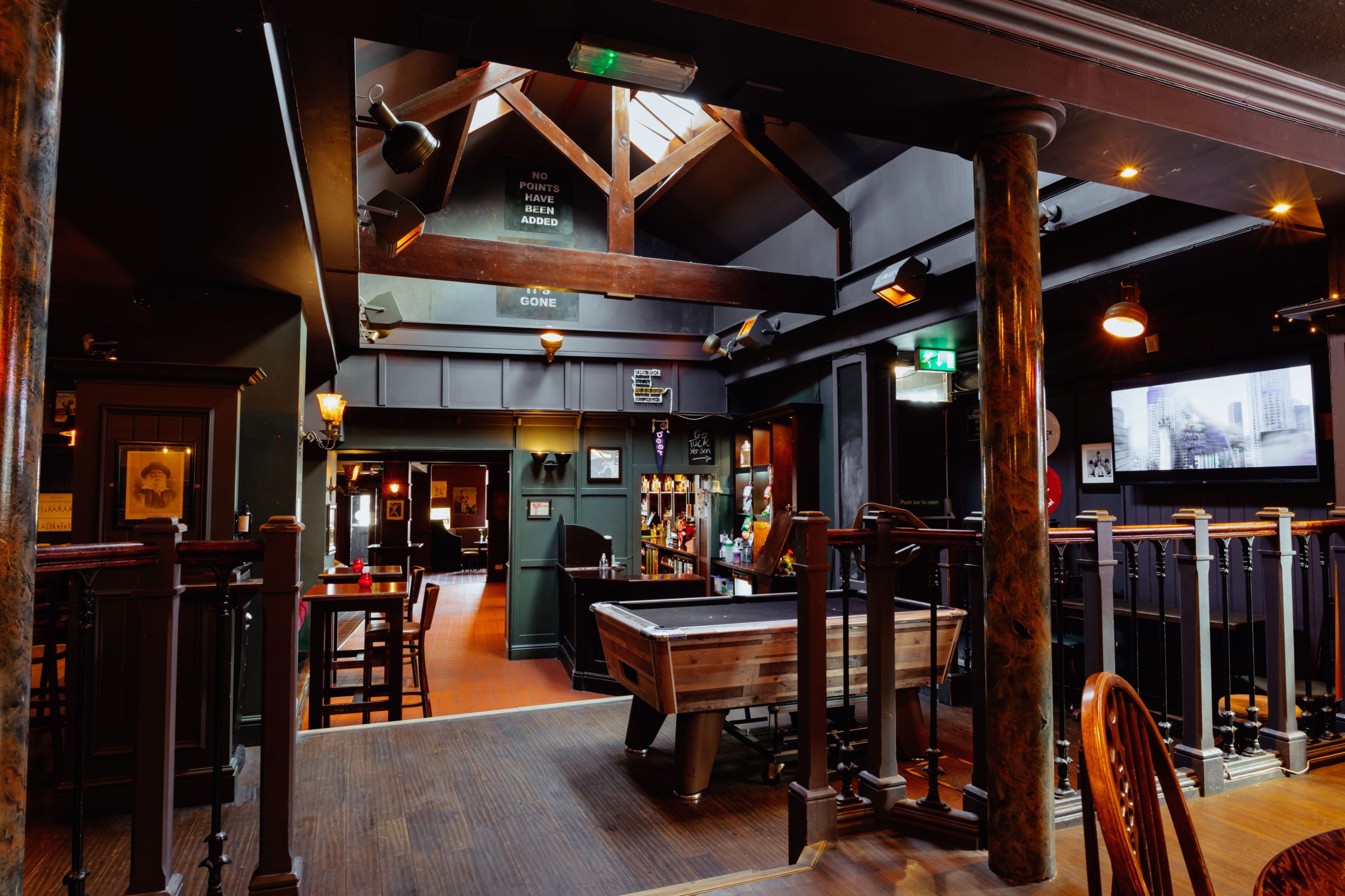 Pool table and sweet shop at The Old Grindstone pub