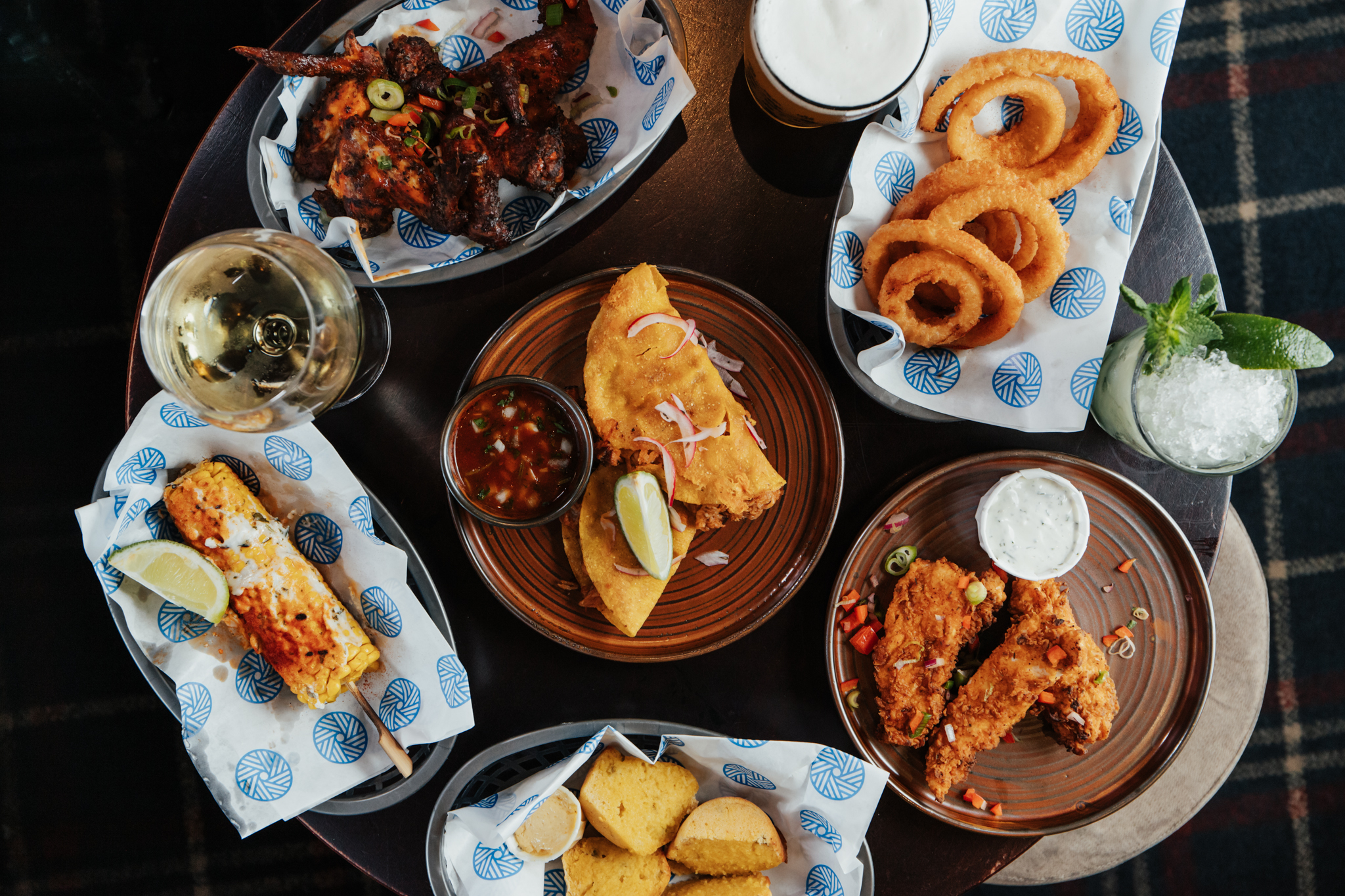 Platter of onion wings, wings drinks at the Old Grindstone