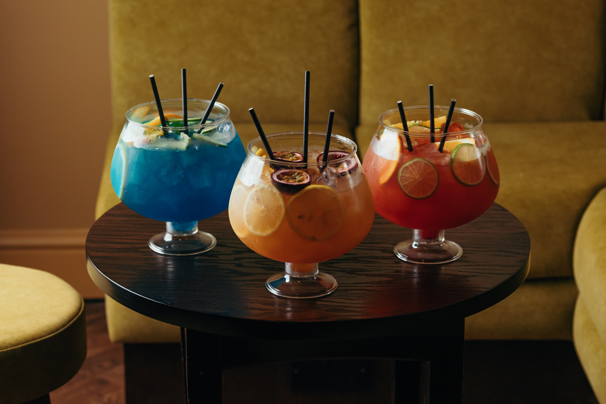 A colourful trio of fish bowl cocktails