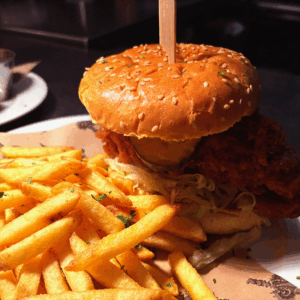 Food offers. Hefty Hen Burgers, Chicken, winter menu, close up, delicious home-cooked food at The Old Grindstone as part of their January food offers.